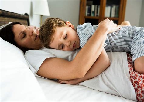 son with sleeping mom